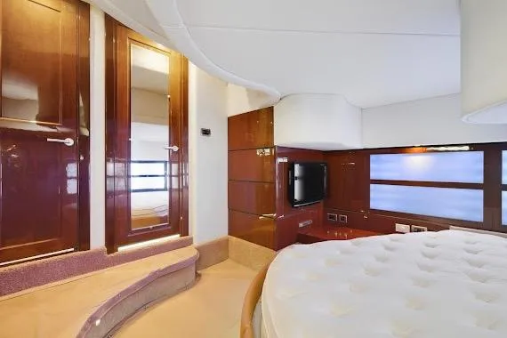  Yacht Photos Pics Luxurious interior of 2008 Sea Ray 47 Sedan Bridge yacht with elegant wood finishes.