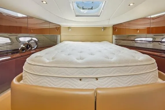  Yacht Photos Pics Luxurious bedroom interior of 2008 Sea Ray 47 Sedan Bridge yacht with plush mattress.