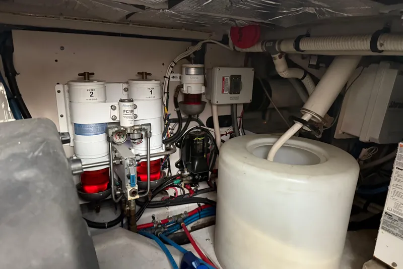  Yacht Photos Pics Engine room of 2008 Sea Ray 47 Sedan Bridge with fuel filters and plumbing.