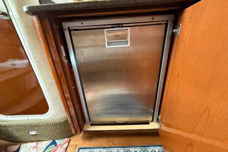  Yacht Photos Pics Stainless steel refrigerator in 2012 Sea Ray 370 Sundancer yacht interior.