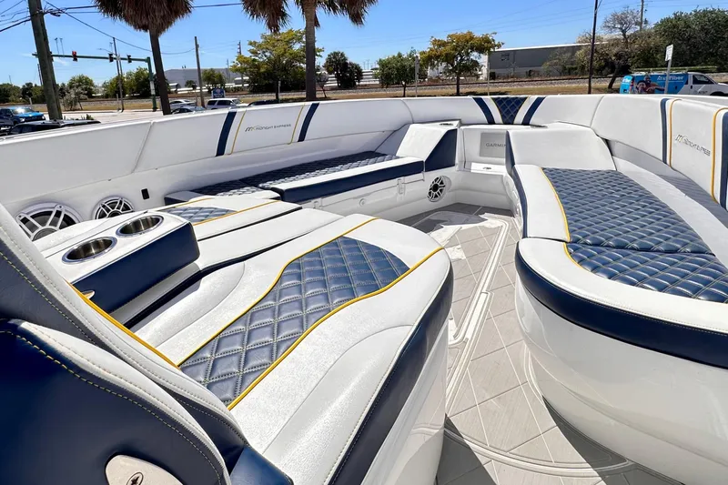 Yacht Photos Pics Luxurious interior of 2022 Midnight Express 37 Open boat with stylish seating and cup holders.