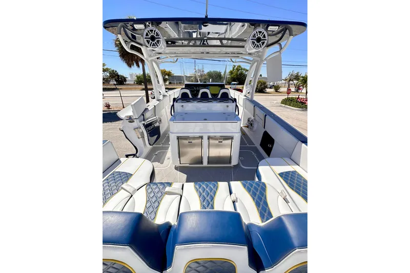  Yacht Photos Pics 2022 Midnight Express 37 Open boat interior with luxurious seating and modern amenities.