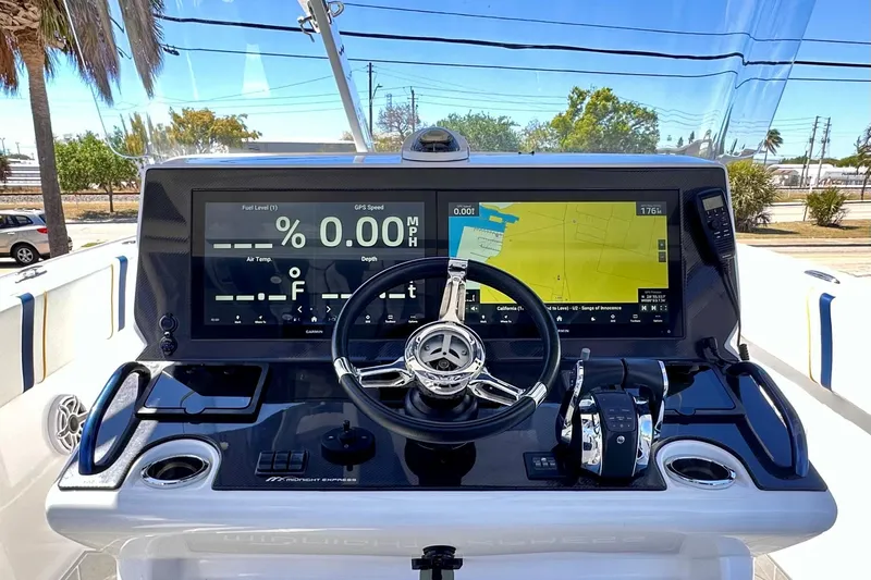  Yacht Photos Pics 2022 Midnight Express 37 Open boat dashboard with advanced navigation and control systems.