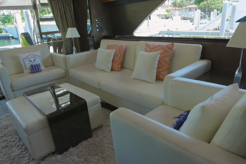  Yacht Photos Pics Luxurious interior of 2014 Fairline Squadron 78 Custom yacht with elegant white seating.