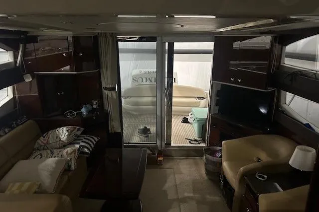  Yacht Photos Pics Interior of 2014 Meridian 441 Sedan yacht with cozy seating and modern amenities.