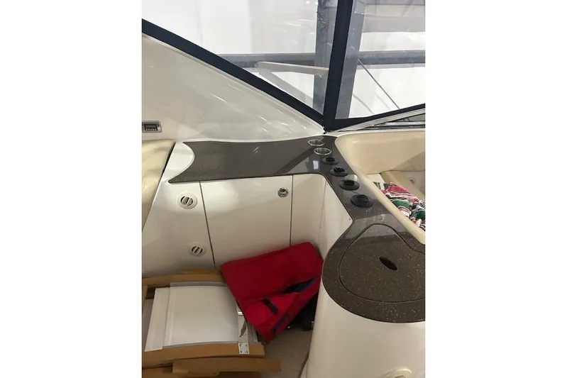  Yacht Photos Pics Interior of 2014 Meridian 441 Sedan yacht with sleek countertops and storage.