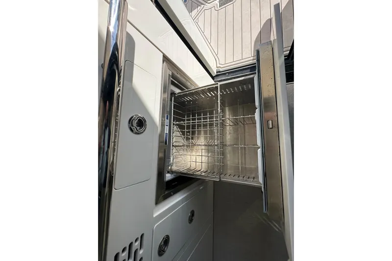  Yacht Photos Pics Open stainless steel refrigerator on 2021 Regal 36 XO boat.