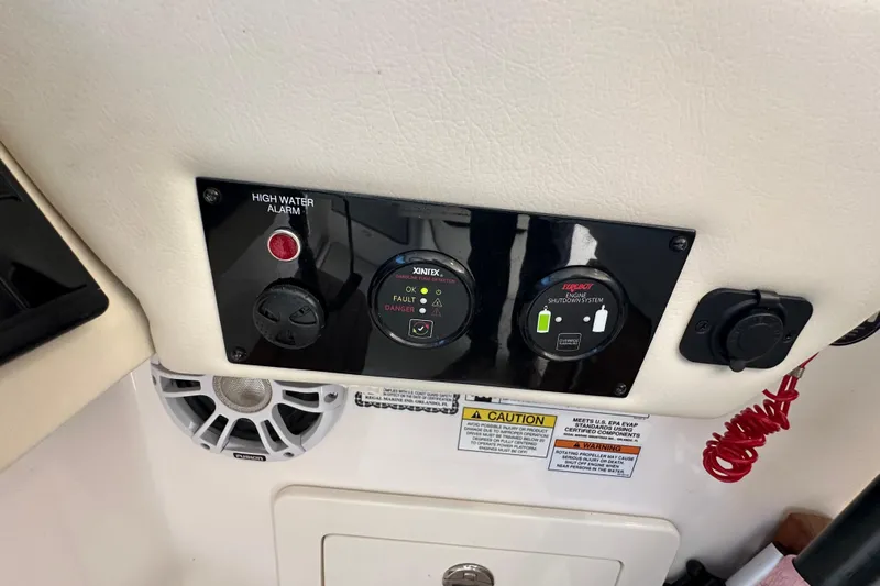  Yacht Photos Pics Control panel of a 2021 Regal 36 XO boat with high water alarm and engine shutdown system.