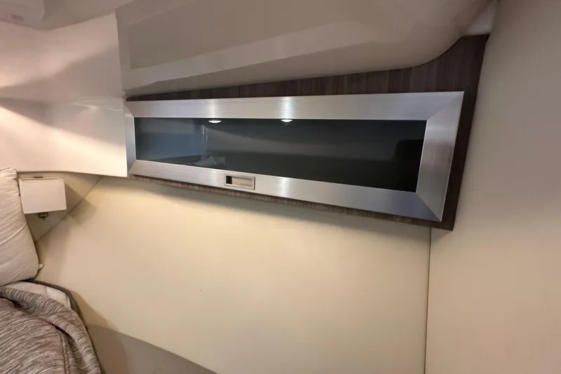  Yacht Photos Pics Interior of 2021 Regal 36 XO yacht with sleek modern cabinetry.