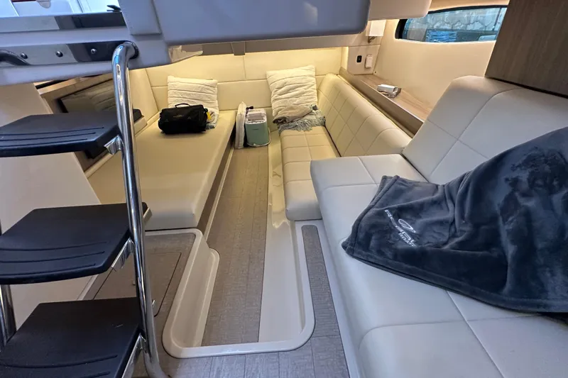  Yacht Photos Pics Luxurious interior of 2021 Regal 36 XO yacht with plush seating and modern design.