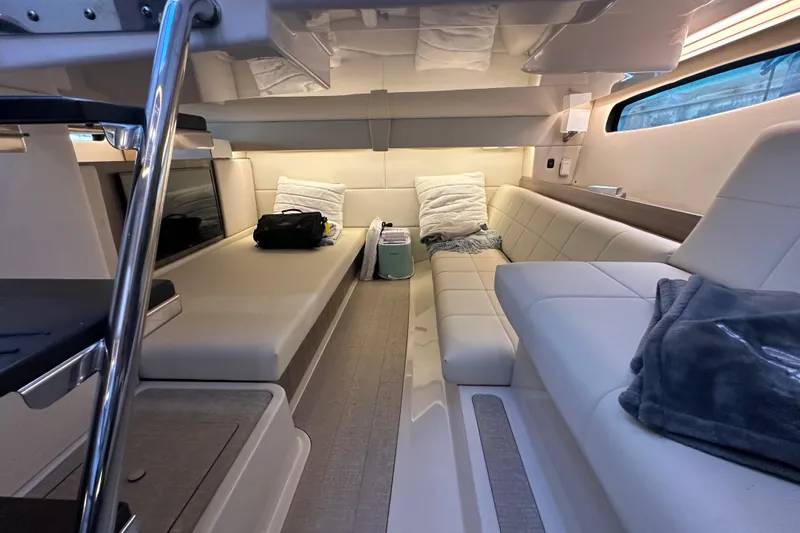  Yacht Photos Pics Luxurious interior of 2021 Regal 36 XO yacht with plush seating and modern design.