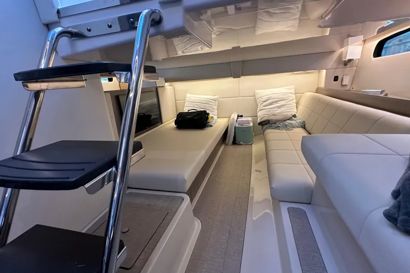  Yacht Photos Pics Luxurious interior of 2021 Regal 36 XO yacht with plush seating and modern design.