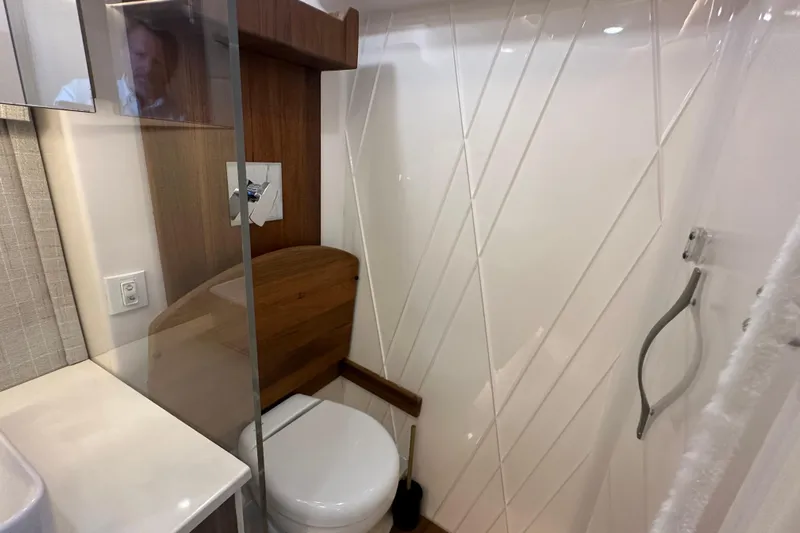  Yacht Photos Pics Modern bathroom interior in 2021 Regal 36 XO yacht with sleek design elements.