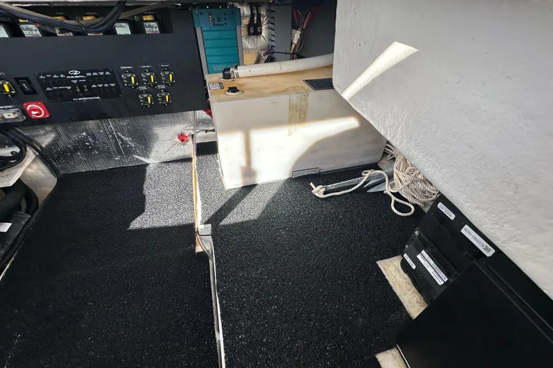  Yacht Photos Pics 2021 Regal 36 XO boat interior with control panel and storage area.