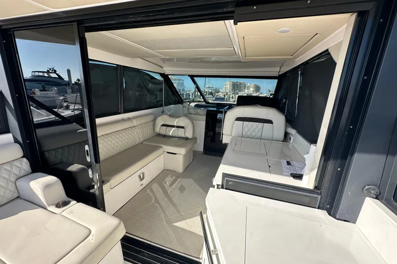  Yacht Photos Pics Luxurious interior of 2021 Regal 36 XO yacht with elegant seating and modern design.