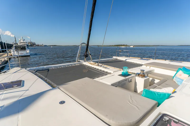 Worth The Wait Yacht Photos Pics Luxurious 2012 Lagoon 560 yacht deck with seating, ocean view, and clear blue sky.