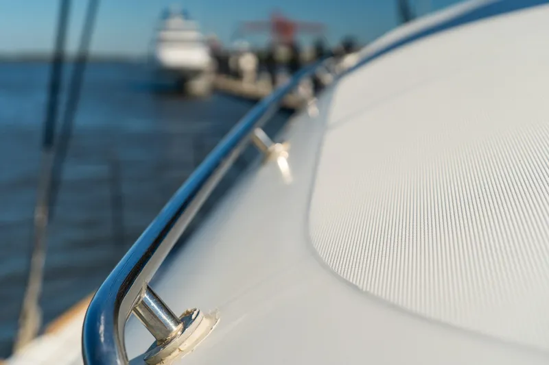 Worth The Wait Yacht Photos Pics Close-up of 2012 Lagoon 560 yacht deck with stainless steel railing.