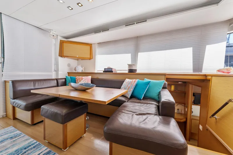 Worth The Wait Yacht Photos Pics Luxurious interior of 2012 Lagoon 560 yacht with leather seating and modern decor.