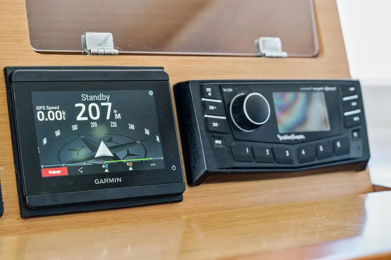 Worth The Wait Yacht Photos Pics Garmin navigation display and control panel on 2012 Lagoon 560 yacht dashboard.