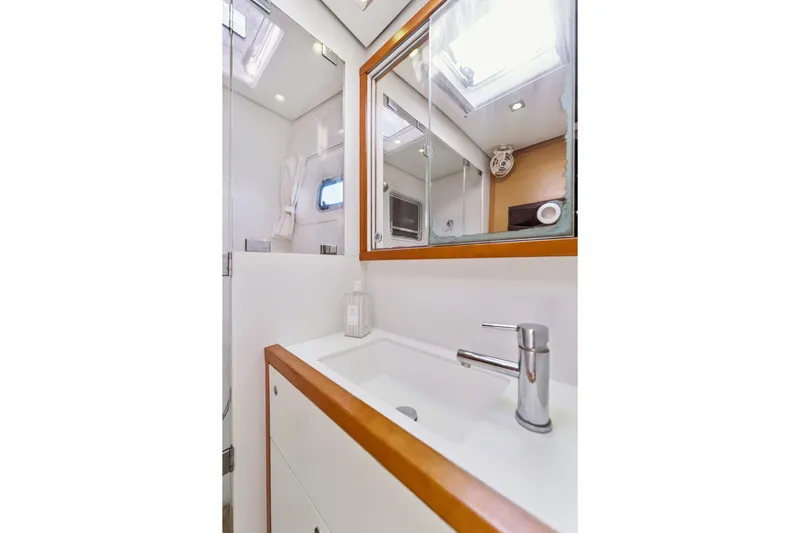 Worth The Wait Yacht Photos Pics Luxurious bathroom interior of 2012 Lagoon 560 yacht with modern fixtures.