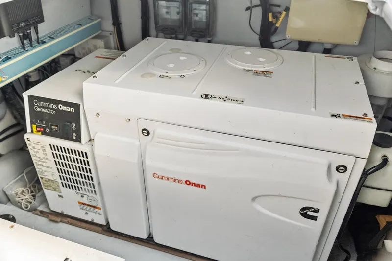 Worth The Wait Yacht Photos Pics Cummins Onan generator in a 2012 Lagoon 560 yacht engine room.