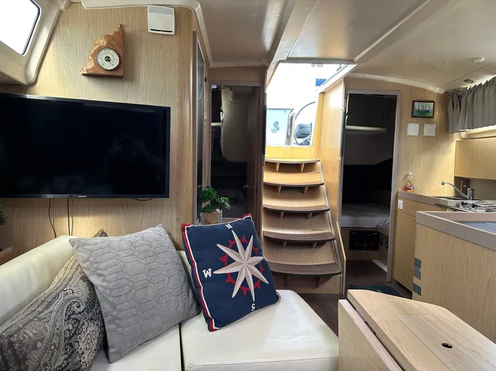  Yacht Photos Pics Interior of 2017 Beneteau Oceanis 41.1 yacht with cozy seating and modern amenities.