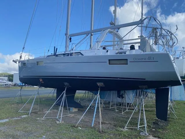  Yacht Photos Pics 2017 Beneteau Oceanis 41.1 sailboat on stands, displayed outdoors under a blue sky.