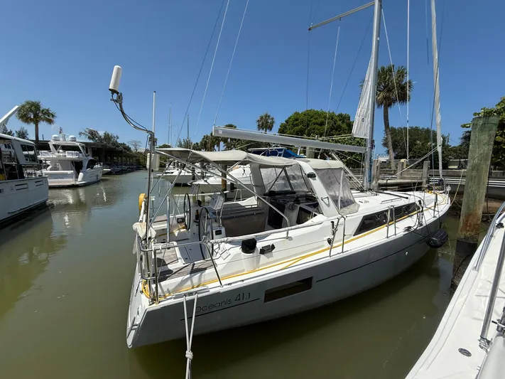  Yacht Photos Pics 2017 Beneteau Oceanis 41.1 sailboat docked in a sunny marina.