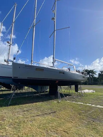  Yacht Photos Pics 2017 Beneteau Oceanis 41.1 sailboat on land, clear sky background.