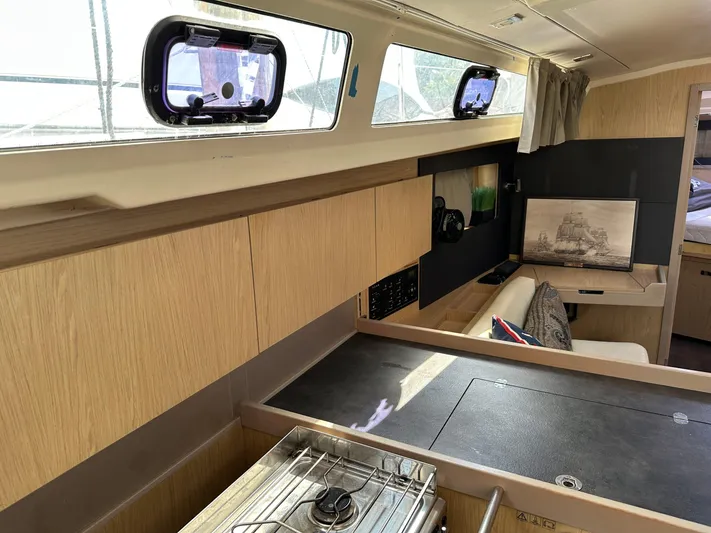  Yacht Photos Pics Interior of 2017 Beneteau Oceanis 41.1 yacht, featuring modern kitchen and seating area.