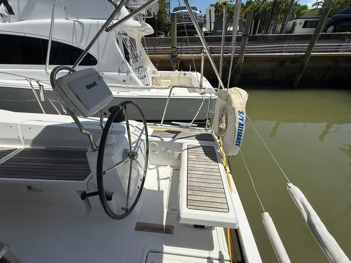  Yacht Photos Pics 2017 Beneteau Oceanis 41.1 sailboat cockpit with steering wheel and seating.