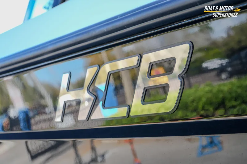  Yacht Photos Pics Close-up of 2023 HCB 39 Speciale logo on a sleek boat exterior.