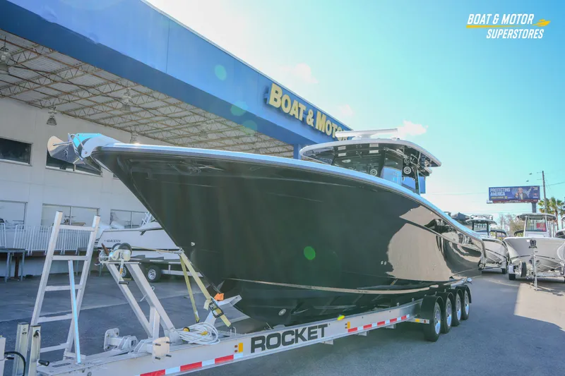  Yacht Photos Pics 2023 HCB 39 Speciale boat on trailer at dealership, Boat & Motor Superstores.