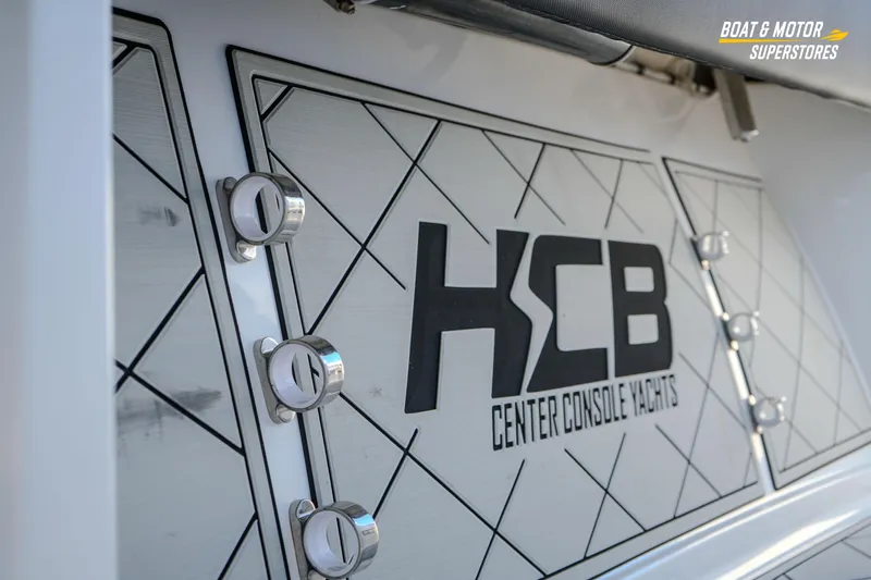 Yacht Photos Pics 2023 HCB 39 Speciale yacht detail with logo and sleek design elements.