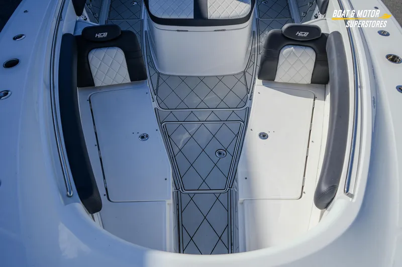  Yacht Photos Pics 2023 HCB 39 Speciale boat interior with diamond-patterned seating and flooring.