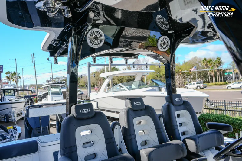  Yacht Photos Pics 2023 HCB 39 Speciale boat interior with luxury seating and audio system.