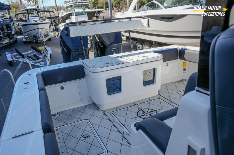  Yacht Photos Pics 2023 HCB 39 Speciale boat interior with seating and storage, displayed at a dealership.