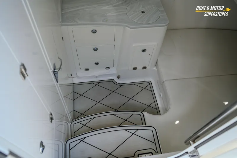  Yacht Photos Pics 2023 HCB 39 Speciale boat interior with storage compartments and sleek flooring design.