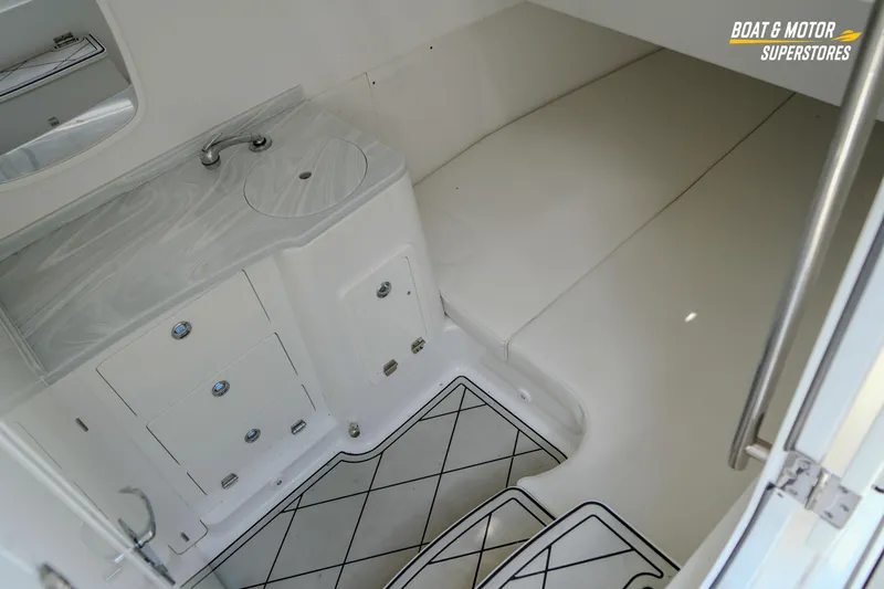  Yacht Photos Pics Interior of 2023 HCB 39 Speciale boat with sink and storage cabinets.