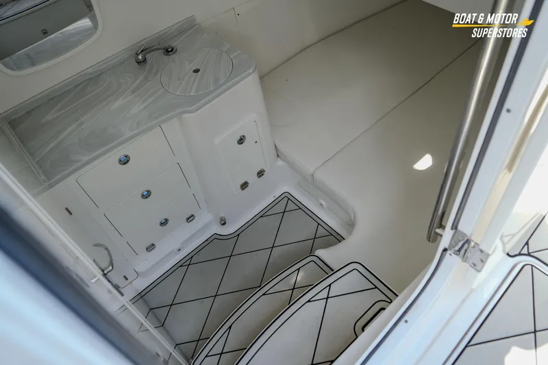  Yacht Photos Pics 2023 HCB 39 Speciale boat interior with sleek cabinetry and cushioned seating.