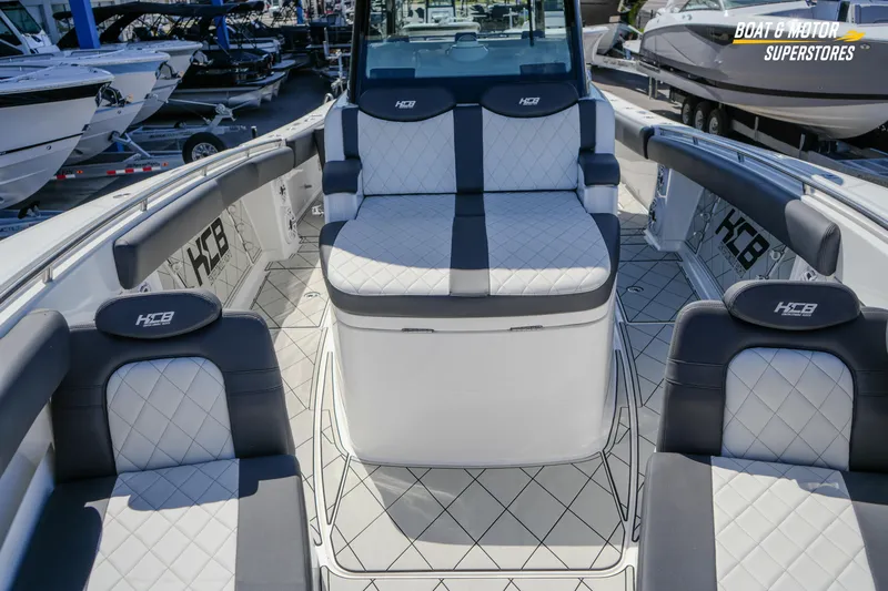  Yacht Photos Pics 2023 HCB 39 Speciale luxury boat interior with quilted seating and modern design.