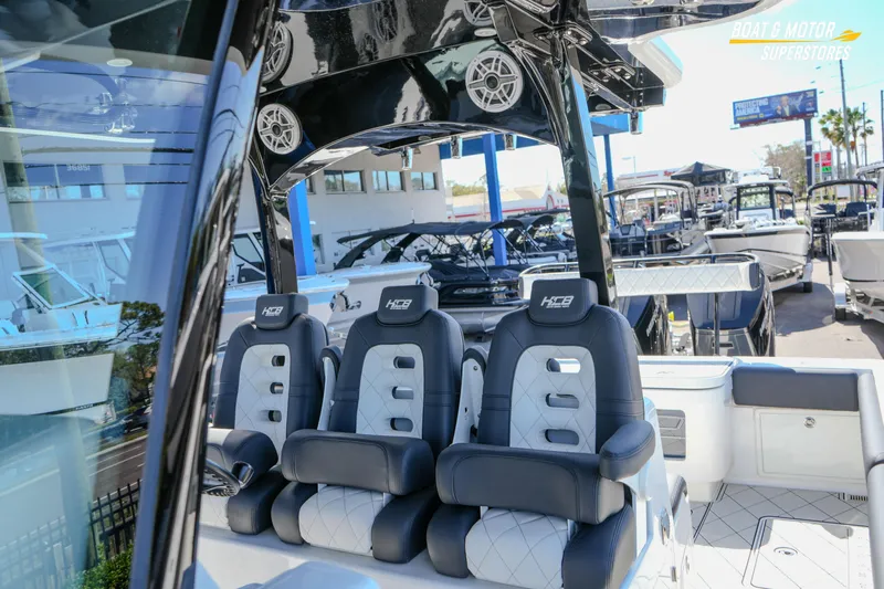  Yacht Photos Pics 2023 HCB 39 Speciale boat interior with luxury seating at a dealership.