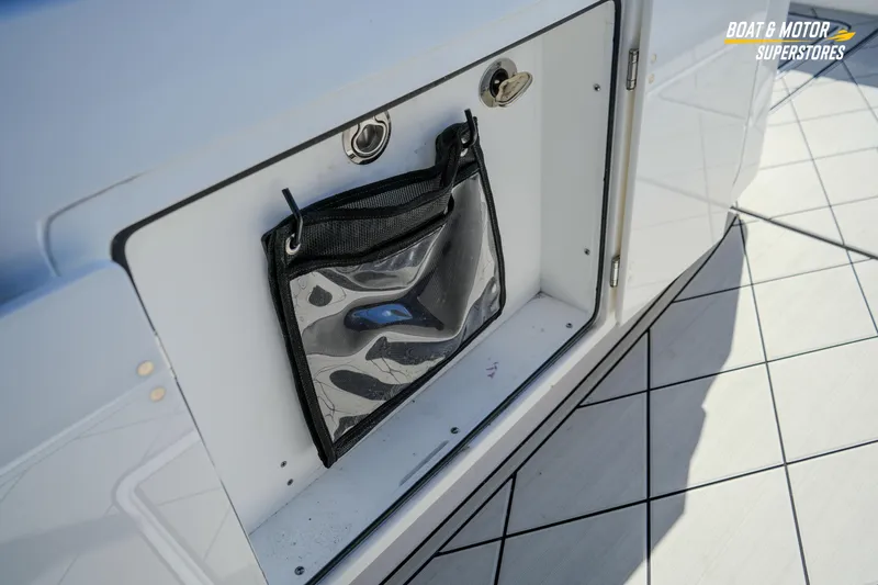  Yacht Photos Pics Storage compartment on 2023 HCB 39 Speciale boat with mesh bag and latch.