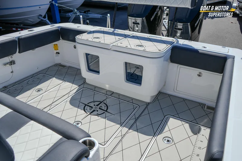  Yacht Photos Pics 2023 HCB 39 Speciale boat interior with cushioned seating and storage compartments.