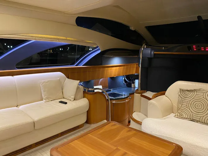  Yacht Photos Pics Luxurious interior of a 2006 Azimut 50 yacht with elegant seating and wooden accents.