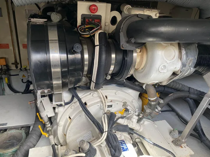  Yacht Photos Pics Engine room of a 2006 Azimut 50 yacht, showcasing mechanical components and wiring.