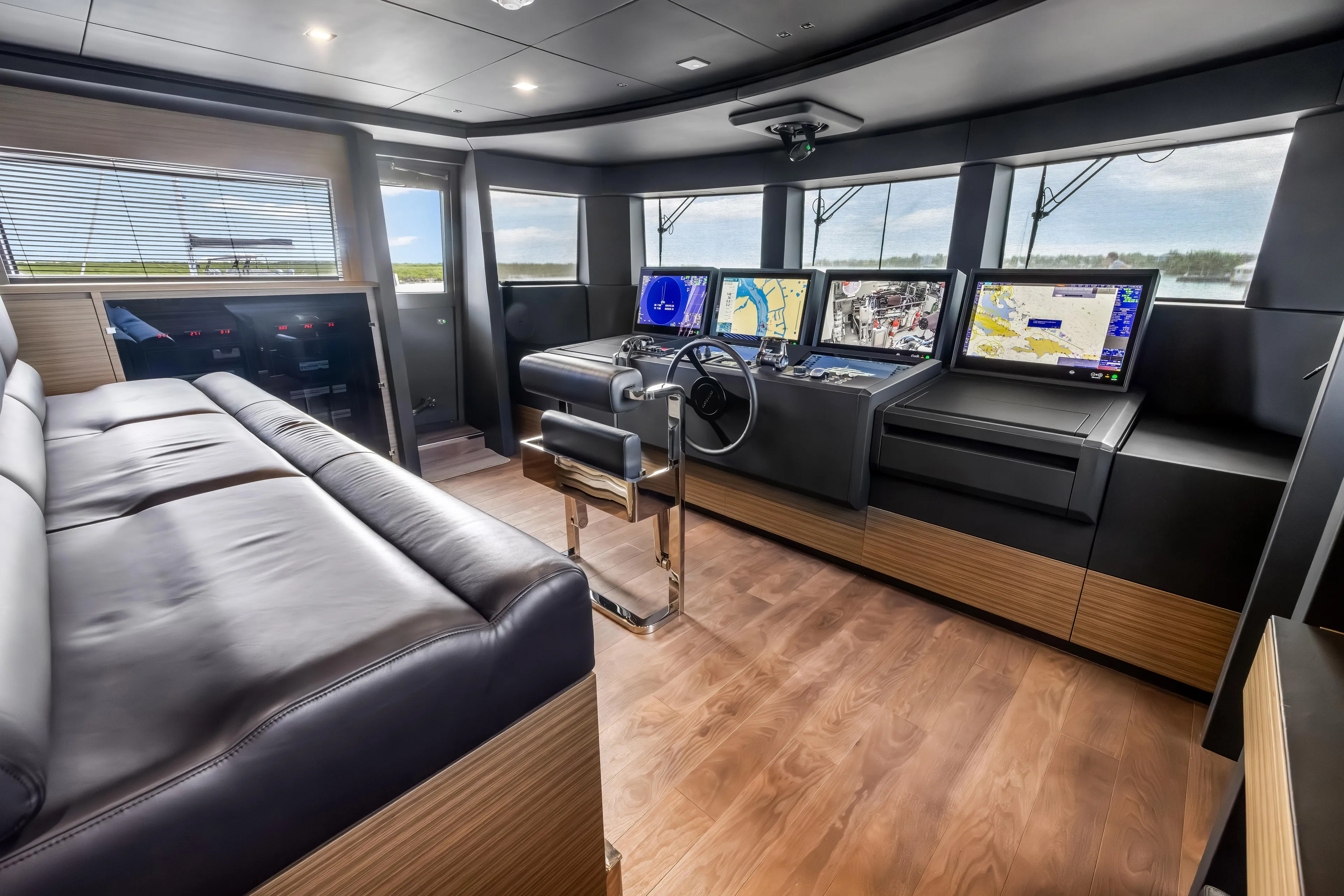 Navetta Yacht Photos Pics Luxurious 2023 Custom Line NAVETTA 42 yacht interior with modern navigation equipment.