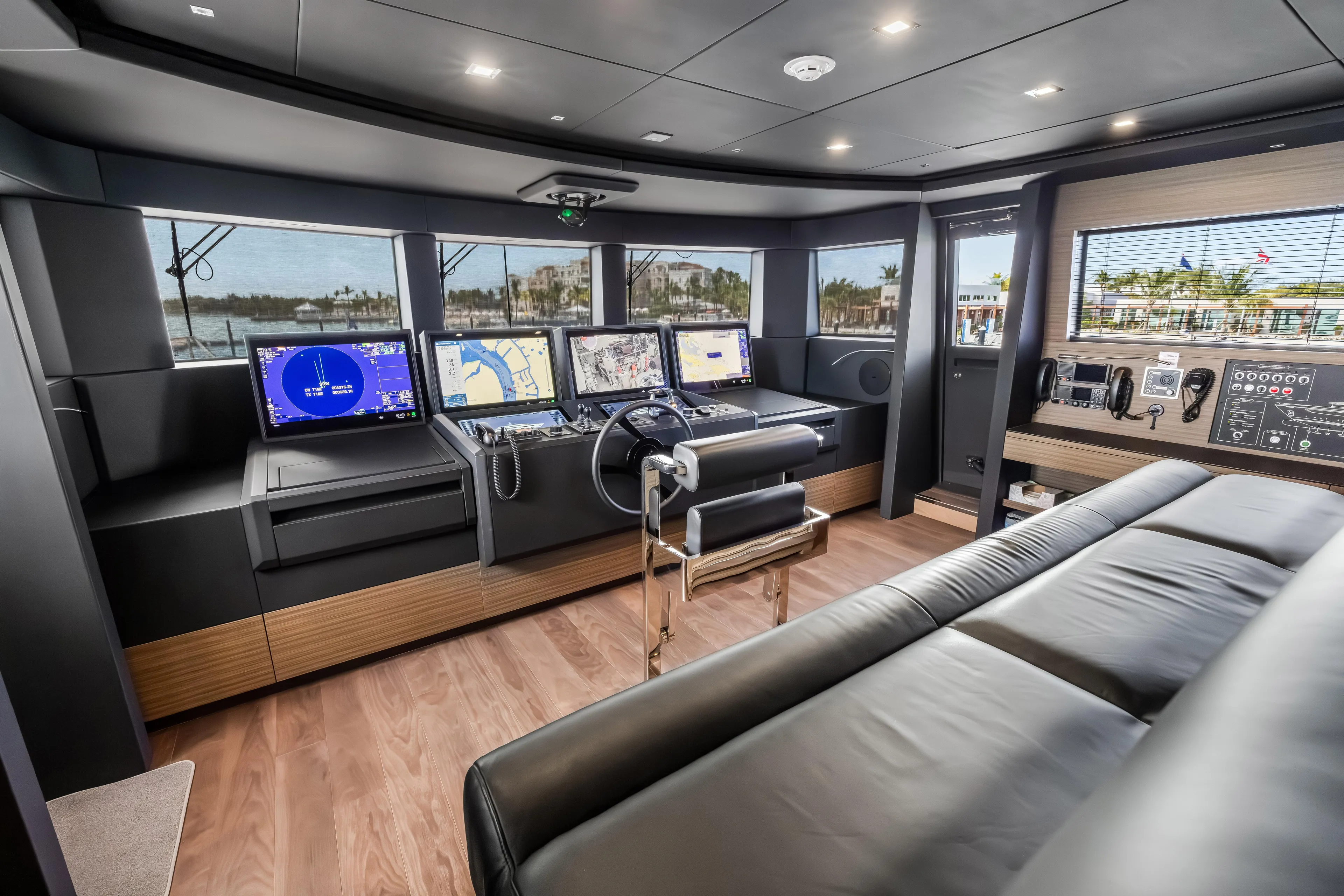 Navetta Yacht Photos Pics Luxurious 2023 Custom Line NAVETTA 42 yacht cockpit with advanced navigation systems.