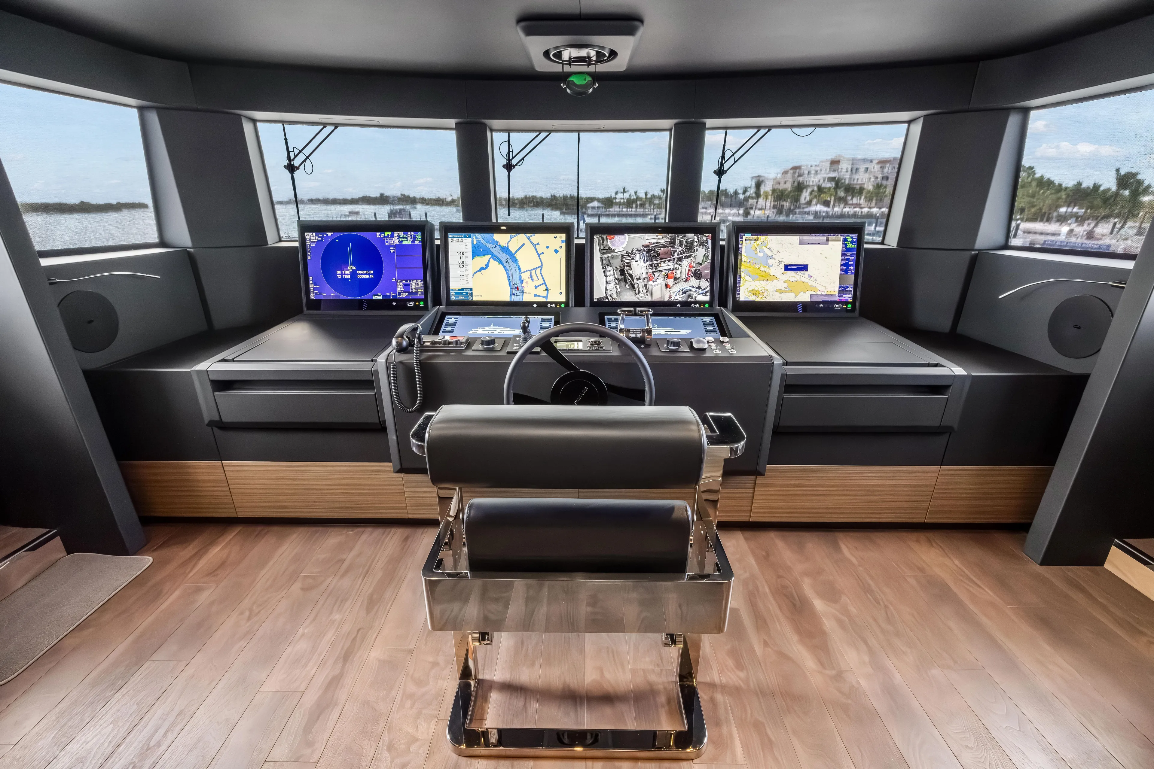 Navetta Yacht Photos Pics Modern helm of 2023 Custom Line NAVETTA 42 yacht with advanced navigation systems.