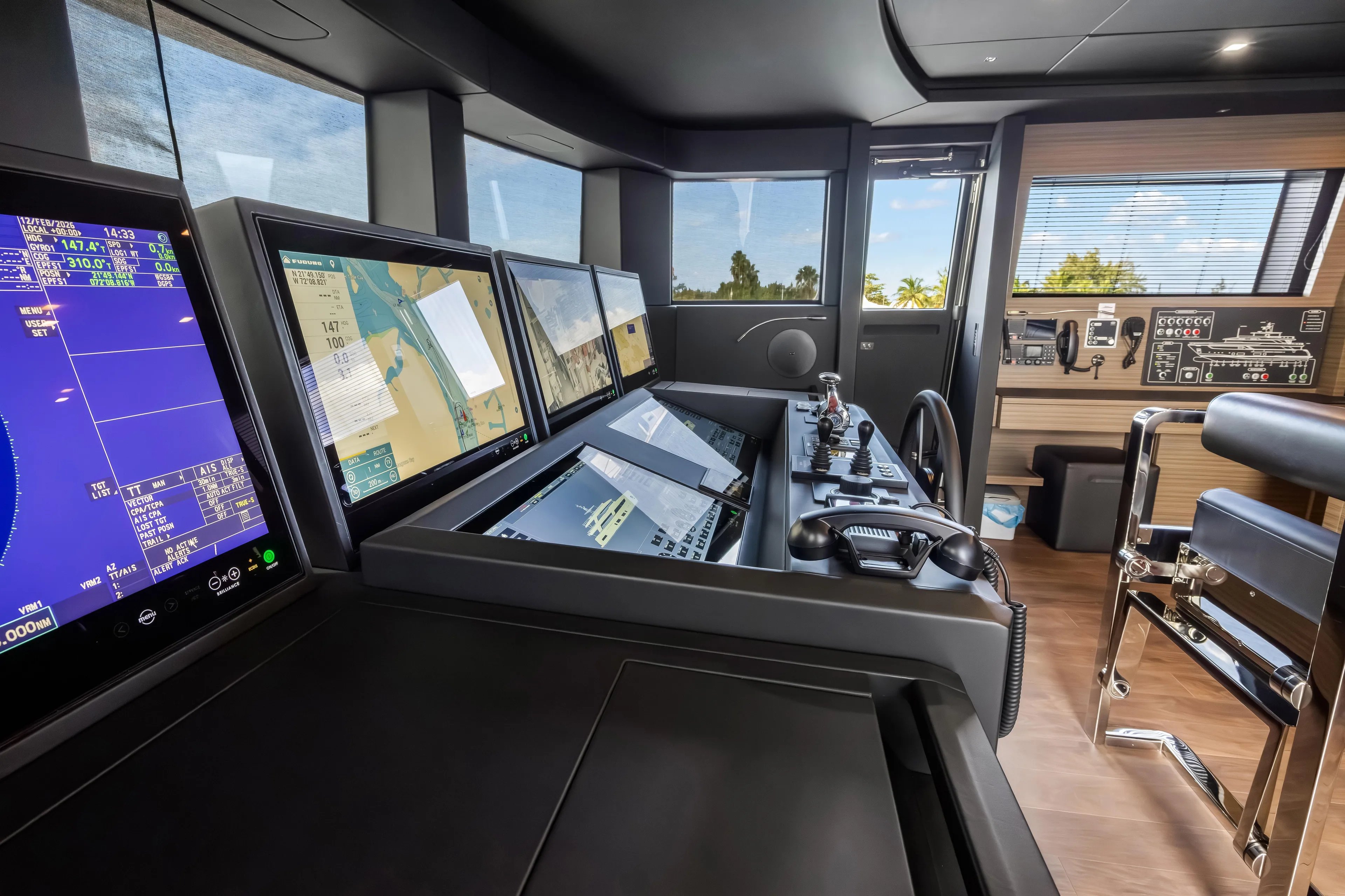Navetta Yacht Photos Pics Modern helm of 2023 Custom Line NAVETTA 42 yacht with advanced navigation systems.